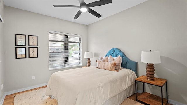 627 Couch Dr Unit S05, Oklahoma City, OK 73102 - bedroom featuring wood finished floors and a ceiling fan