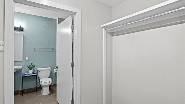 627 Couch Dr Unit S05, Oklahoma City, OK 73102 - bathroom with toilet and tile patterned floors