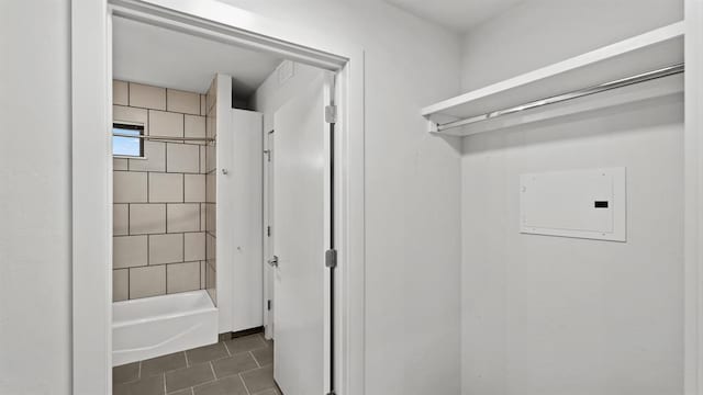 627 Couch Dr Unit S05, Oklahoma City, OK 73102 - laundry area featuring dark tile patterned floors