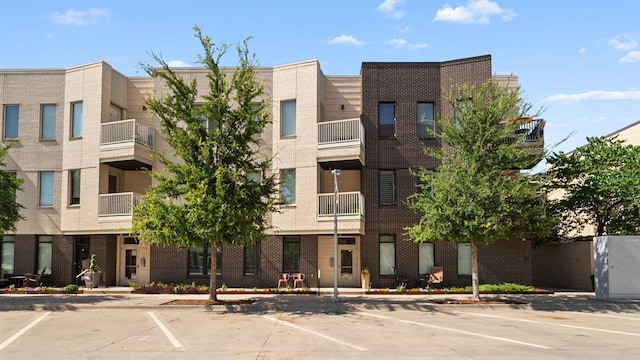 627 Couch Dr Unit S05, Oklahoma City, OK 73102 - view of property with uncovered parking