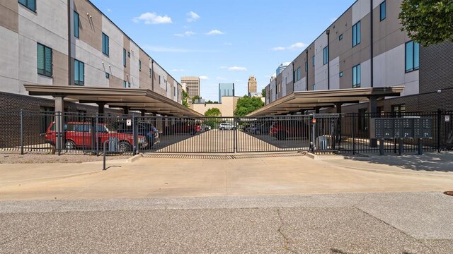 627 Couch Dr Unit S05, Oklahoma City, OK 73102 - view of property's community featuring covered parking and mail area
