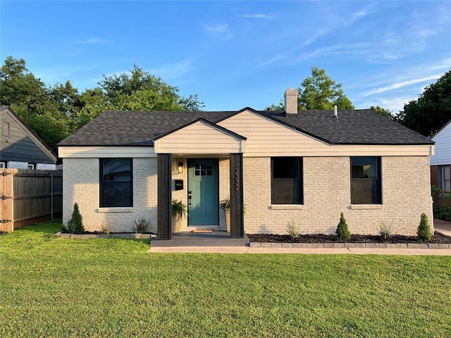 2332 NW 31st St, Oklahoma City, OK 73112 - ranch-style house featuring brick siding, a chimney, and roof with shingles