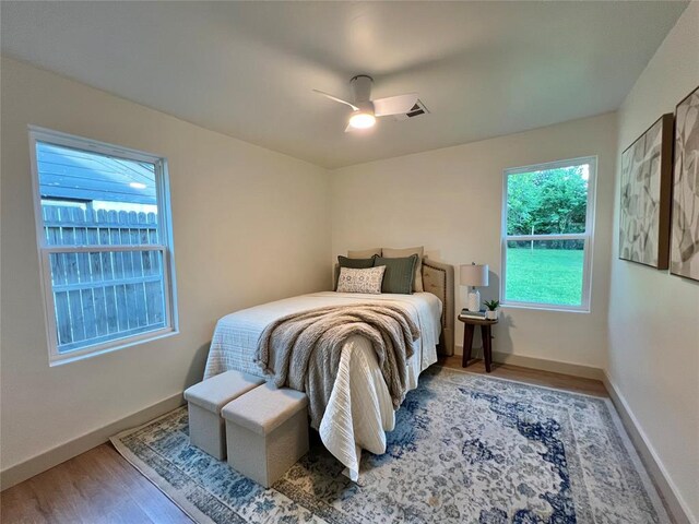 2332 NW 31st St, Oklahoma City, OK 73112 - bedroom with wood finished floors and a ceiling fan