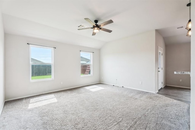 1016 N Deer Court Way, Mustang, OK 73064 - empty room featuring a ceiling fan, carpet floors, and lofted ceiling