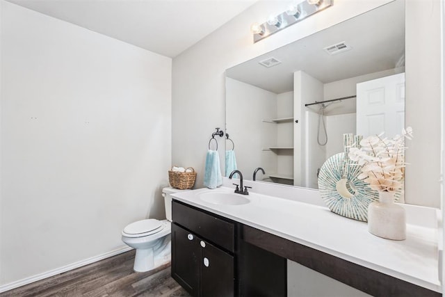 1016 N Deer Court Way, Mustang, OK 73064 - full bathroom featuring wood finished floors, vanity, and a shower