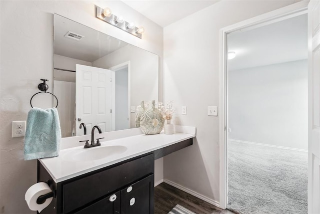 1016 N Deer Court Way, Mustang, OK 73064 - bathroom with vanity and baseboards