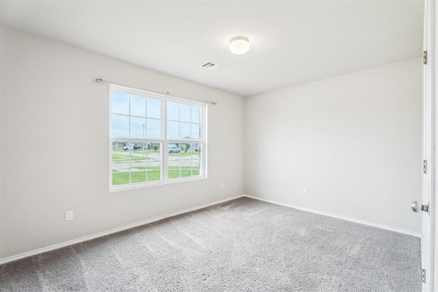 1016 N Deer Court Way, Mustang, OK 73064 - carpeted empty room with baseboards