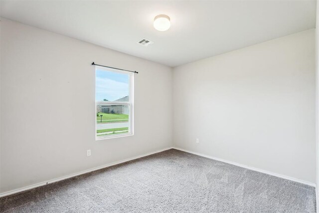 1016 N Deer Court Way, Mustang, OK 73064 - carpeted spare room with baseboards
