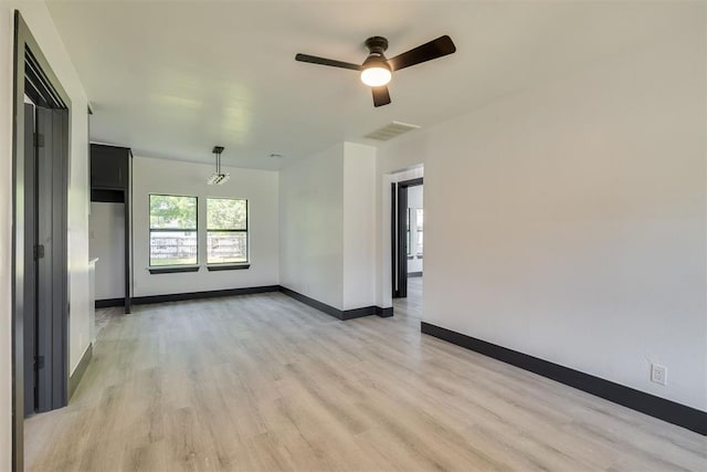 2325 SW Binkley St, Oklahoma City, OK 73119 - empty room with light wood-style floors and a ceiling fan
