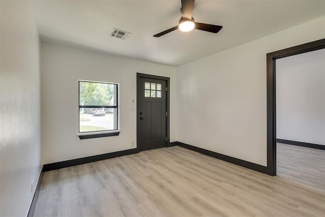 2325 SW Binkley St, Oklahoma City, OK 73119 - foyer entrance with light wood-style floors and ceiling fan