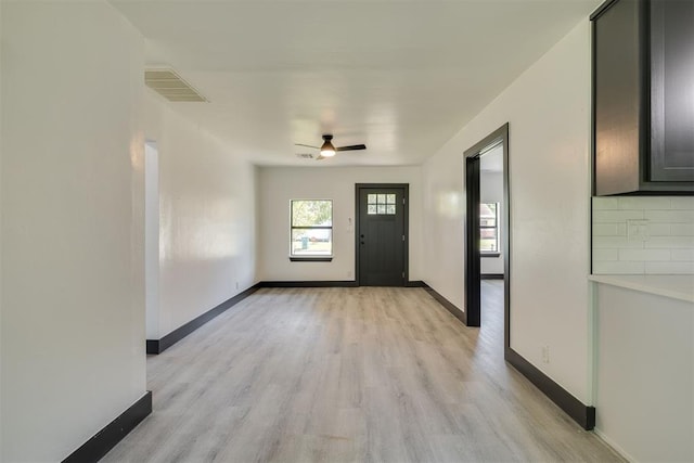2325 SW Binkley St, Oklahoma City, OK 73119 - entryway featuring light wood-type flooring and ceiling fan