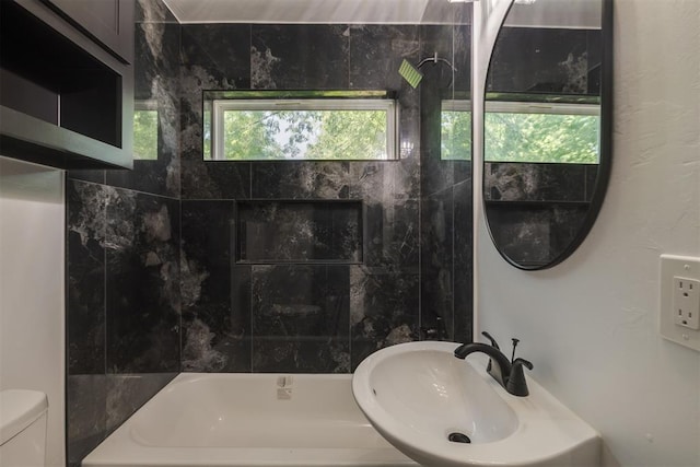 2325 SW Binkley St, Oklahoma City, OK 73119 - full bath featuring a sink and washtub / shower combination