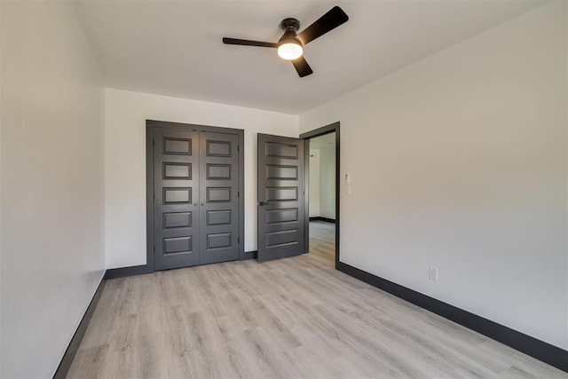 2325 SW Binkley St, Oklahoma City, OK 73119 - unfurnished bedroom with light wood-style floors and a ceiling fan