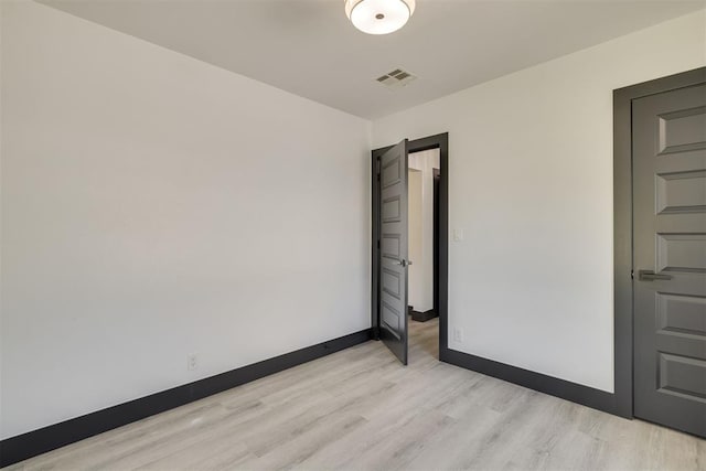 2325 SW Binkley St, Oklahoma City, OK 73119 - unfurnished bedroom with light wood-style flooring and baseboards