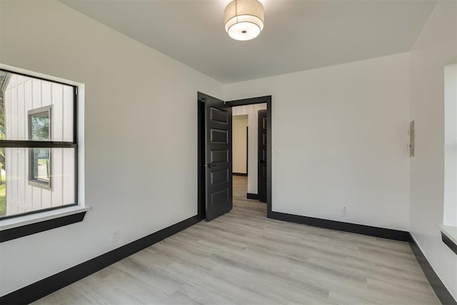 2325 SW Binkley St, Oklahoma City, OK 73119 - spare room with light wood-style flooring and baseboards