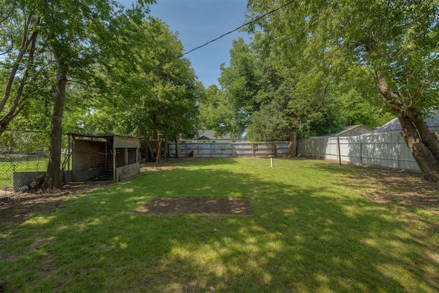 2325 SW Binkley St, Oklahoma City, OK 73119 - fenced backyard featuring an outdoor structure