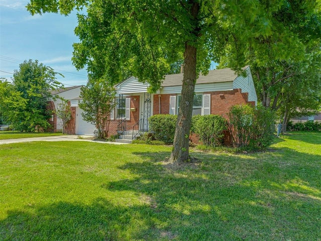 7235 SE 15th St, Midwest City, OK 73110 - ranch-style home featuring brick siding, concrete driveway, a front yard, and an attached garage
