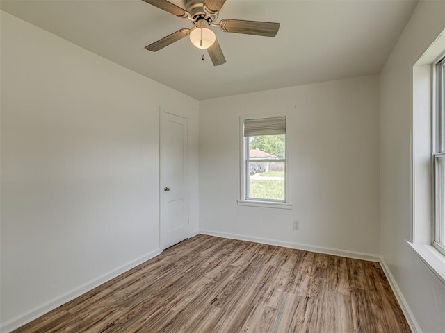 7235 SE 15th St, Midwest City, OK 73110 - unfurnished room with wood finished floors and a ceiling fan