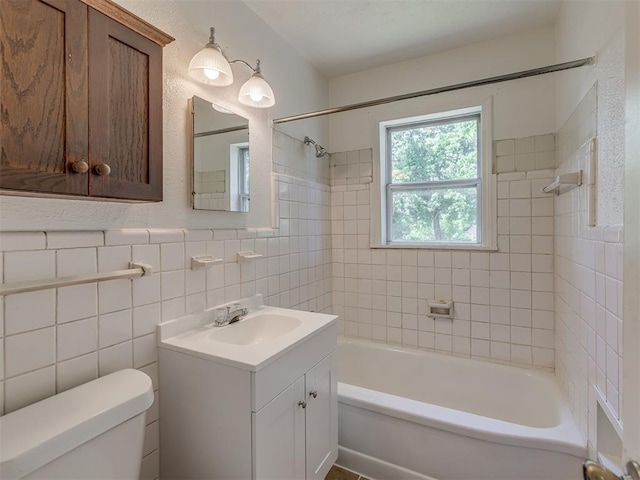 7235 SE 15th St, Midwest City, OK 73110 - full bath with vanity, washtub / shower combination, and tile walls