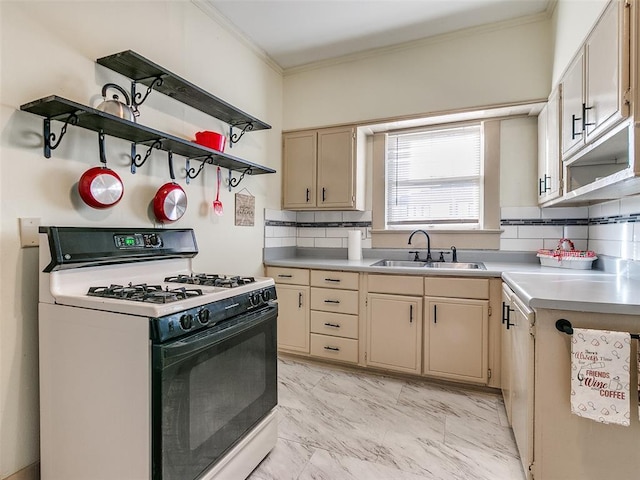 312 NW 24th St, Oklahoma City, OK 73103 - kitchen featuring gas stove, ornamental molding, light countertops, tasteful backsplash, and open shelves