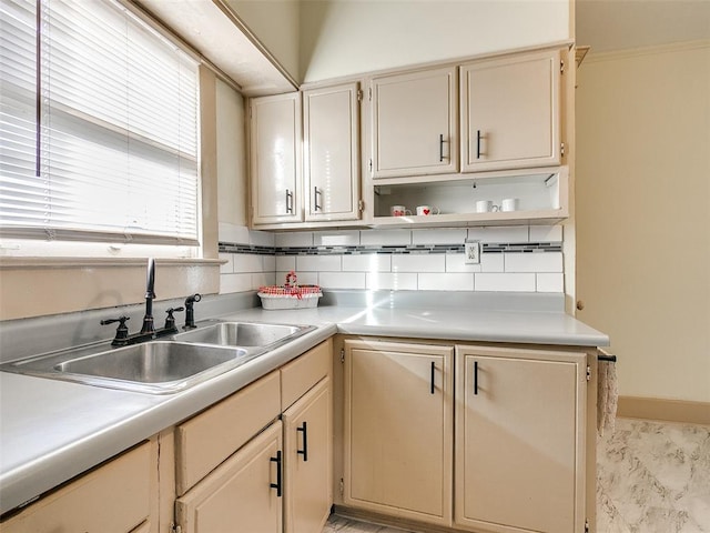 312 NW 24th St, Oklahoma City, OK 73103 - kitchen featuring light countertops, open shelves, and cream cabinetry