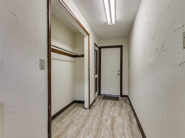312 NW 24th St, Oklahoma City, OK 73103 - corridor with light wood-style flooring and baseboards