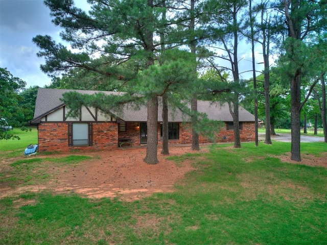 3908 Southwestern Ave, Edmond, OK 73034 - view of front of home featuring brick siding and a front yard