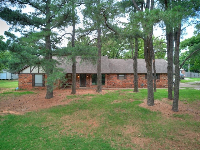 3908 Southwestern Ave, Edmond, OK 73034 - view of front of house featuring brick siding and roof with shingles