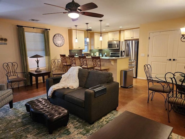 3908 Southwestern Ave, Edmond, OK 73034 - living area with a ceiling fan and recessed lighting