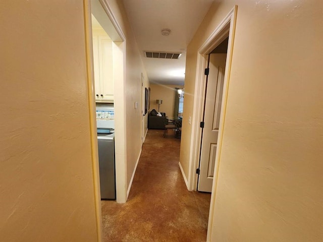 3908 Southwestern Ave, Edmond, OK 73034 - hall featuring washer / dryer