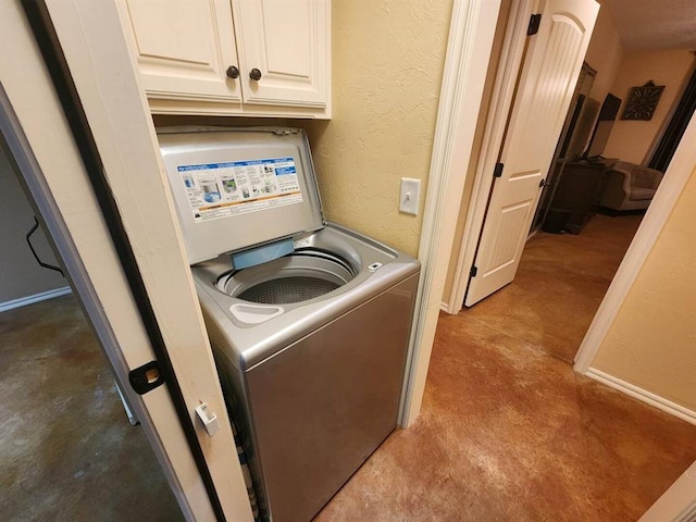 3908 Southwestern Ave, Edmond, OK 73034 - laundry room featuring washer / dryer and cabinet space