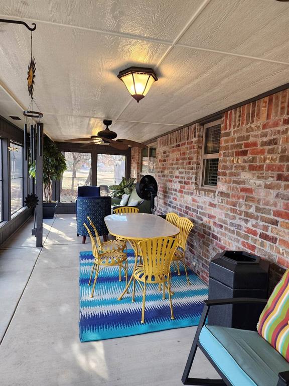 3908 Southwestern Ave, Edmond, OK 73034 - view of patio / terrace with outdoor dining area and ceiling fan