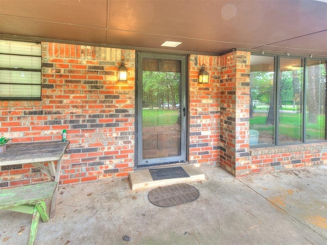 3908 Southwestern Ave, Edmond, OK 73034 - doorway to property with brick siding
