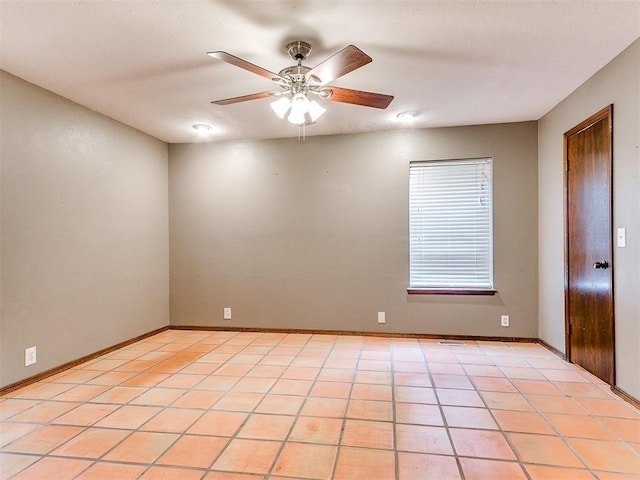 3908 Southwestern Ave, Edmond, OK 73034 - empty room featuring a ceiling fan and light tile patterned flooring