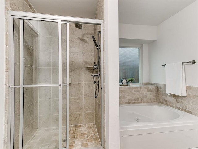 19940 Vivace Ct, Edmond, OK 73013 - bathroom featuring a tub with jets and a shower stall