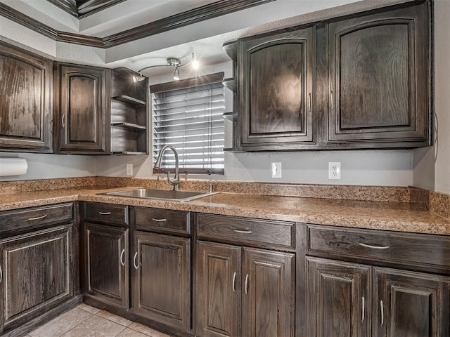 503 W Owens St, El Reno, OK 73036 - kitchen featuring dark brown cabinetry, light tile patterned floors, ornamental molding, and open shelves