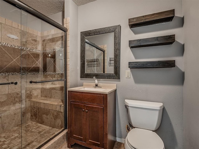 503 W Owens St, El Reno, OK 73036 - full bathroom with a stall shower, vanity, and a textured ceiling