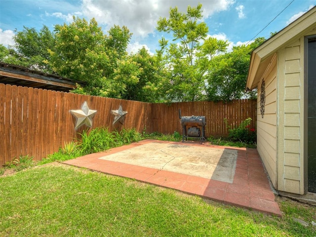 503 W Owens St, El Reno, OK 73036 - fenced backyard with a patio