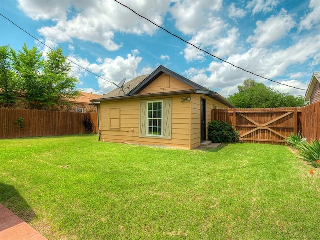503 W Owens St, El Reno, OK 73036 - rear view of property featuring a fenced backyard and a gate