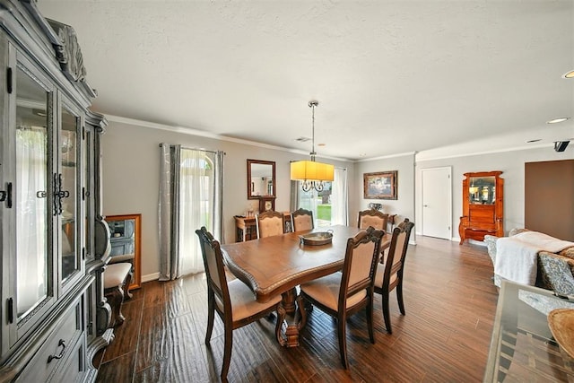 7617 N Ann Arbor Ave, Oklahoma City, OK 73132 - dining room with healthy amount of natural light, dark wood-style flooring, and ornamental molding