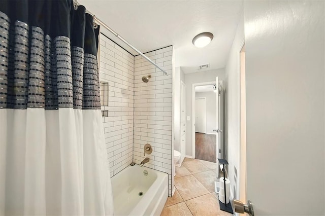7617 N Ann Arbor Ave, Oklahoma City, OK 73132 - bathroom featuring tile patterned floors and shower / bathtub combination with curtain