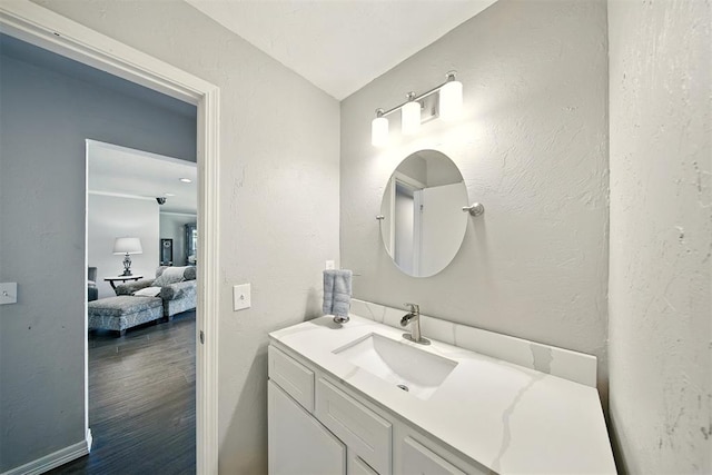 7617 N Ann Arbor Ave, Oklahoma City, OK 73132 - bathroom with vanity and wood finished floors