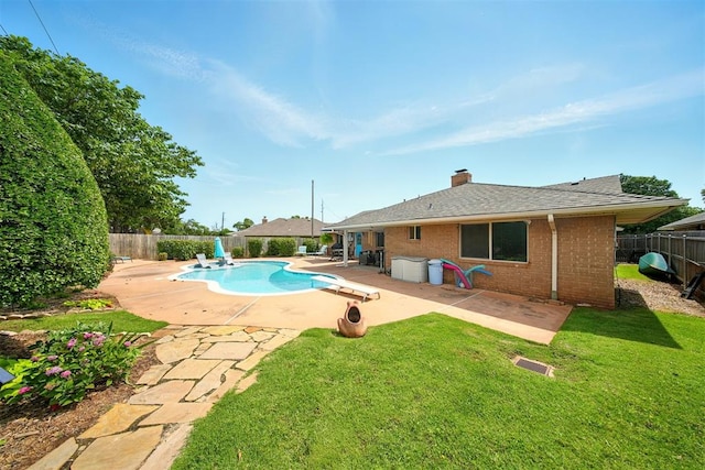 7617 N Ann Arbor Ave, Oklahoma City, OK 73132 - view of swimming pool with a fenced backyard and a patio
