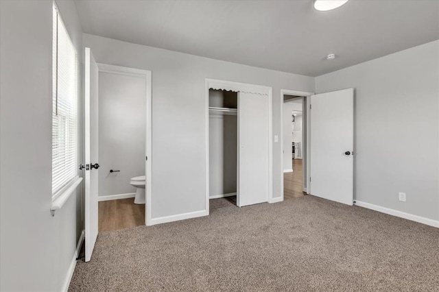 112 Asbill Ave, Yukon, OK 73099 - unfurnished bedroom featuring carpet flooring, a closet, and connected bathroom