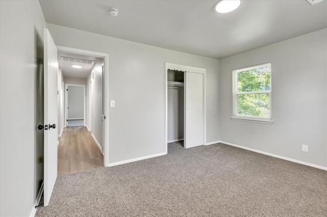 112 Asbill Ave, Yukon, OK 73099 - unfurnished bedroom with carpet flooring and a closet