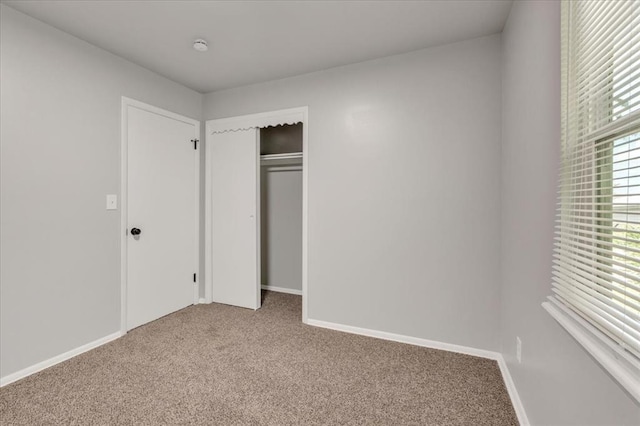 112 Asbill Ave, Yukon, OK 73099 - unfurnished bedroom featuring carpet floors and a closet