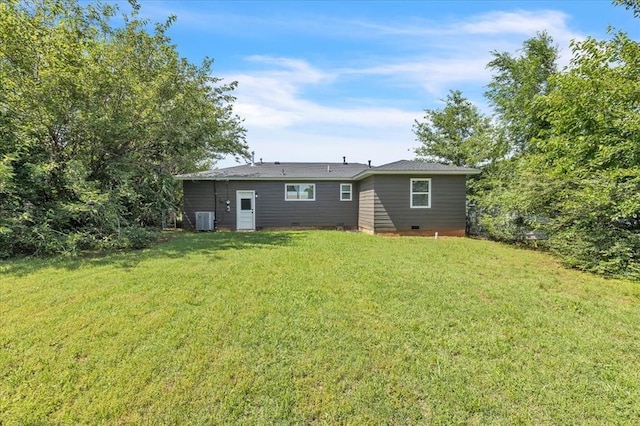 112 Asbill Ave, Yukon, OK 73099 - rear view of house with crawl space and a yard
