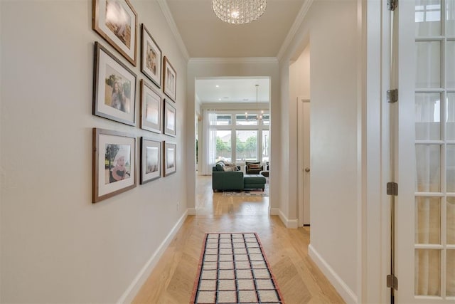3824 Library Ln, Edmond, OK 73034 - hall featuring a chandelier, light wood-style floors, and ornamental molding