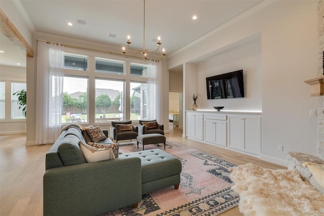 3824 Library Ln, Edmond, OK 73034 - living room with ornamental molding, light wood-type flooring, a chandelier, and recessed lighting
