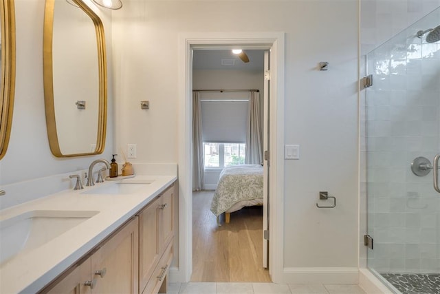 3824 Library Ln, Edmond, OK 73034 - full bath with a shower stall, double vanity, and connected bathroom